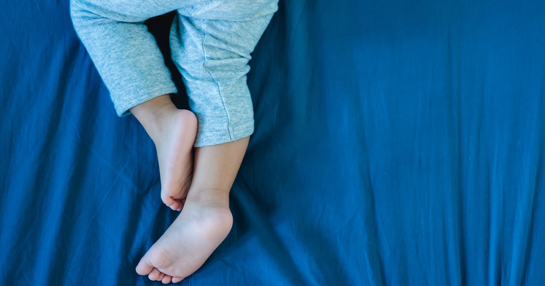 Image of child's legs.