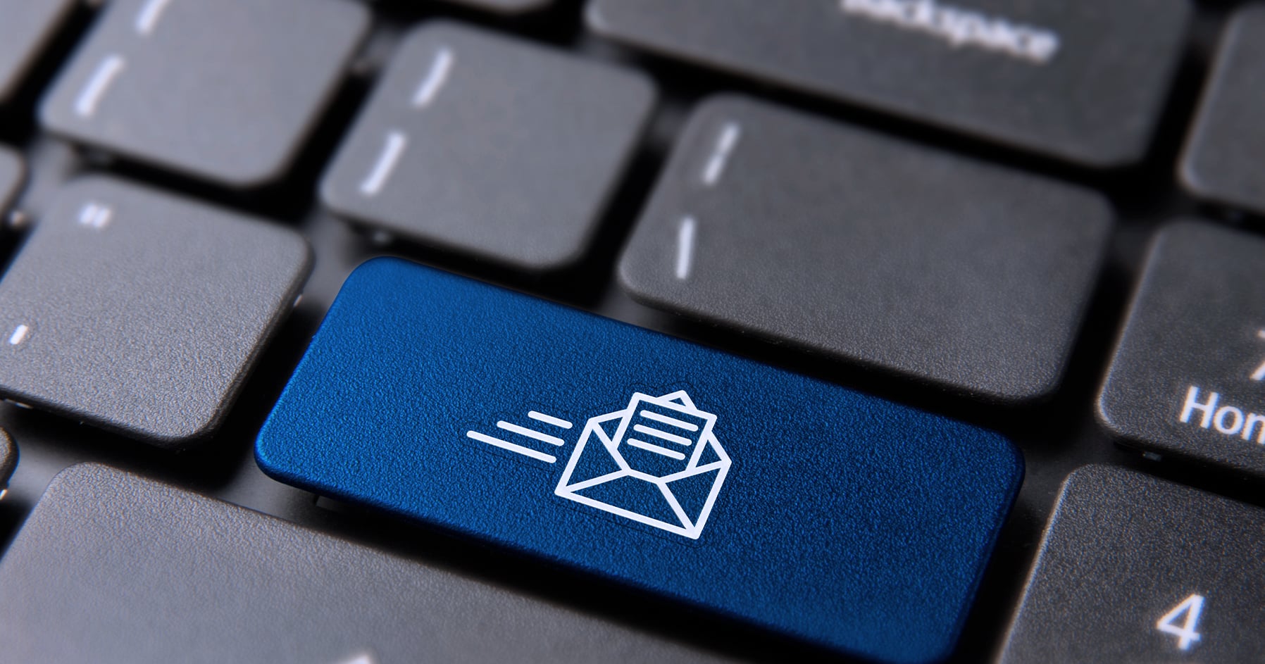 Keyboard key with a e-newsletter graphic 